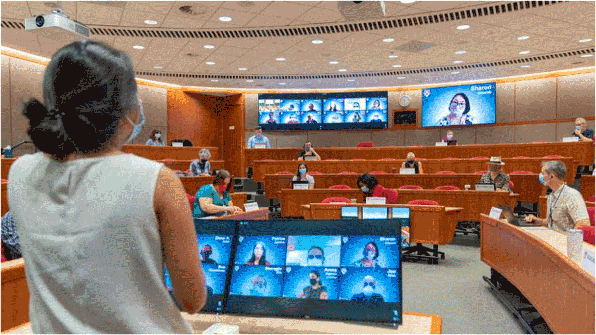 Photo of a renovated classroom with Zoom participants integrated with the in-person students.